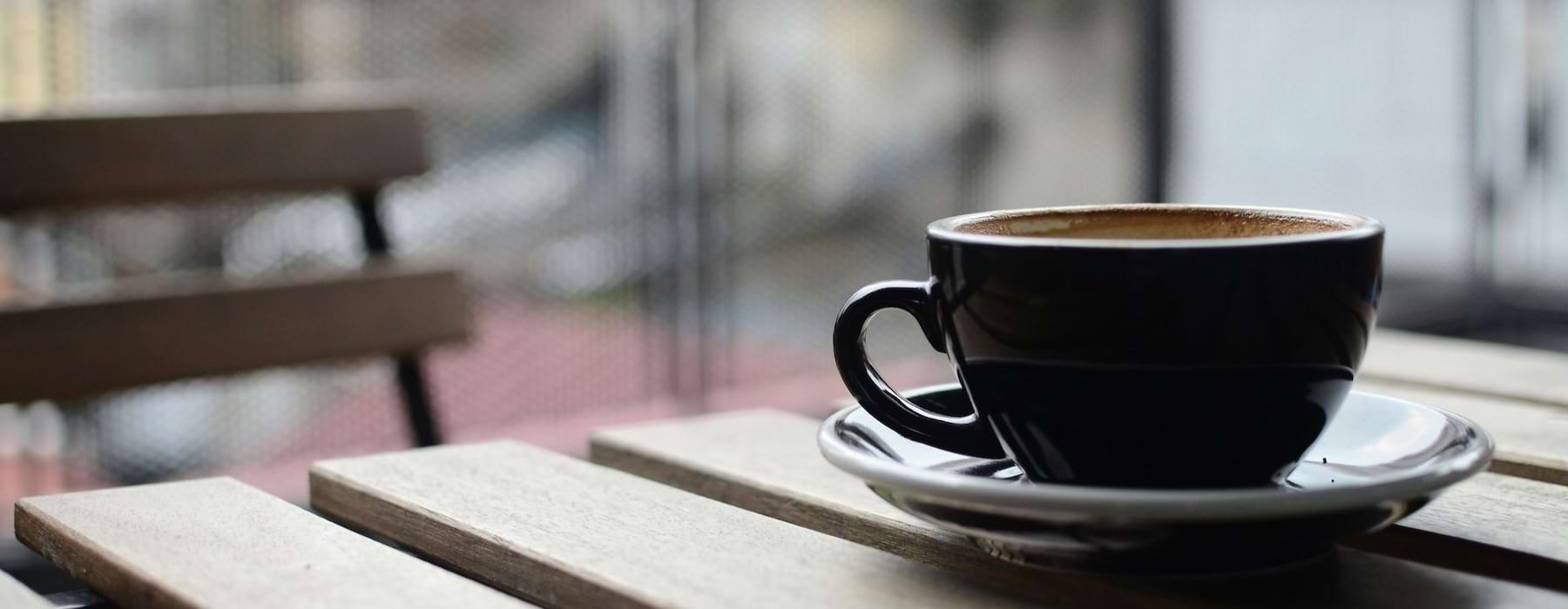 a cup of coffee on a table