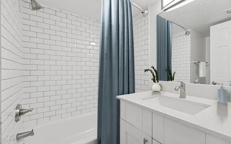 a bathroom with a sink and a bathtub