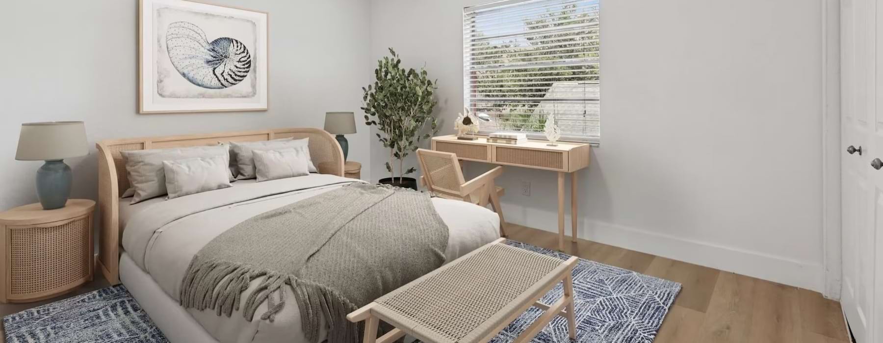 a bedroom with a bed and tables